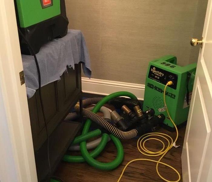 InjectiDry cleaning on wood floors in a bathroom